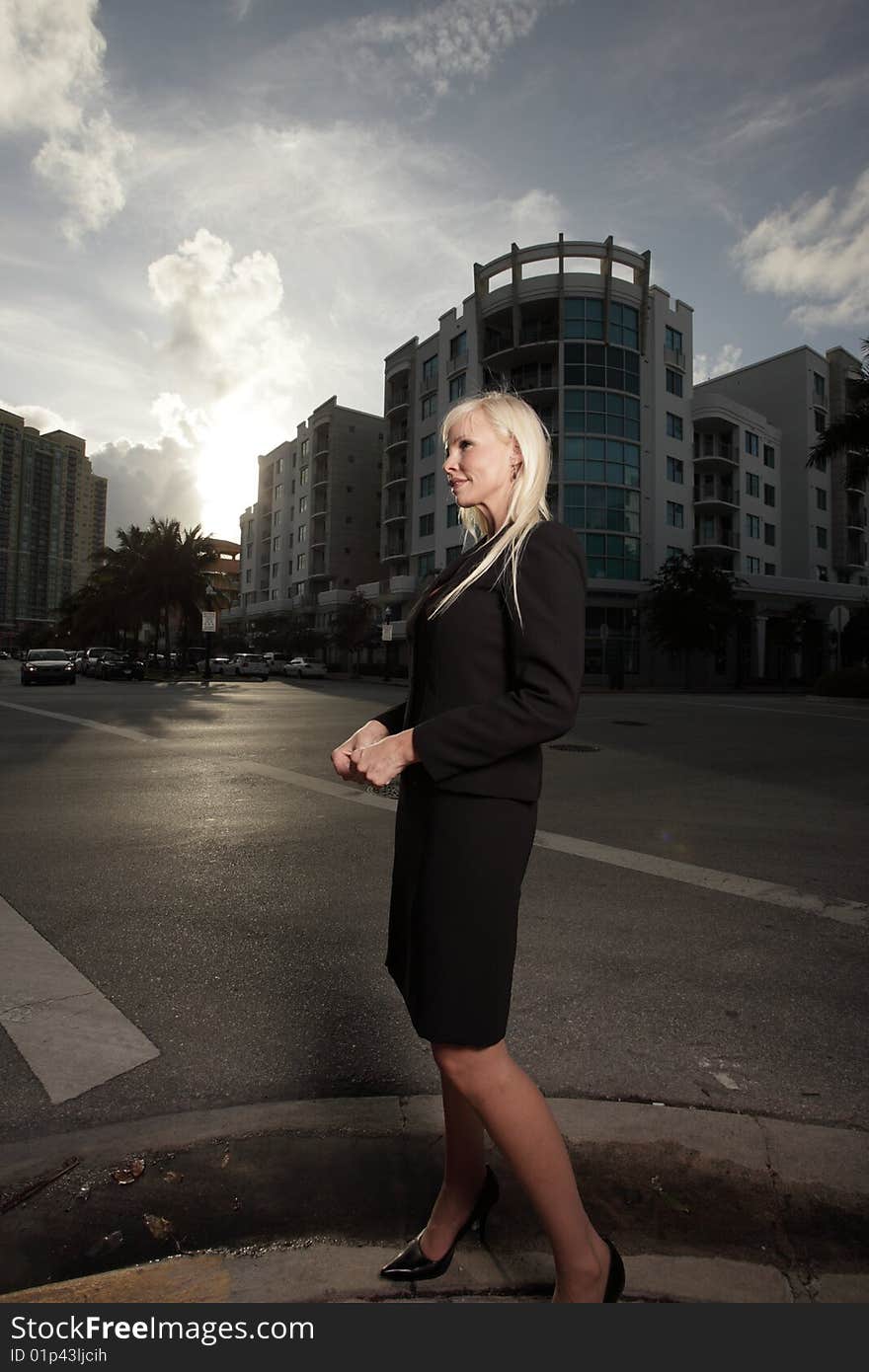 Profile of a young businesswoman on the street