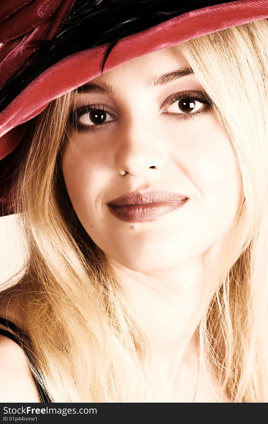 Beautiful young blond female wearing a hat. Beautiful young blond female wearing a hat