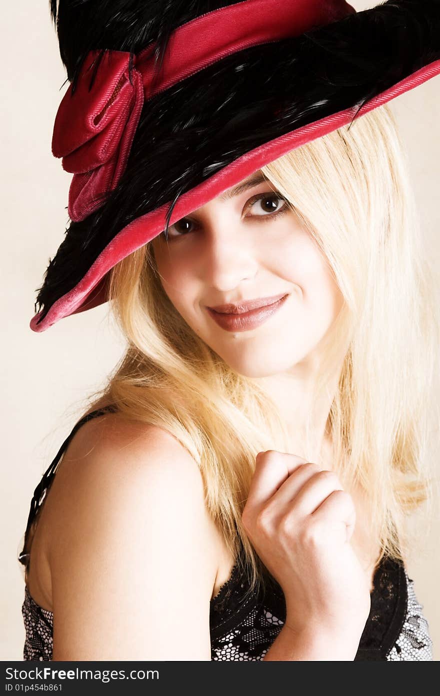 Beautiful young blond female wearing a hat. Beautiful young blond female wearing a hat