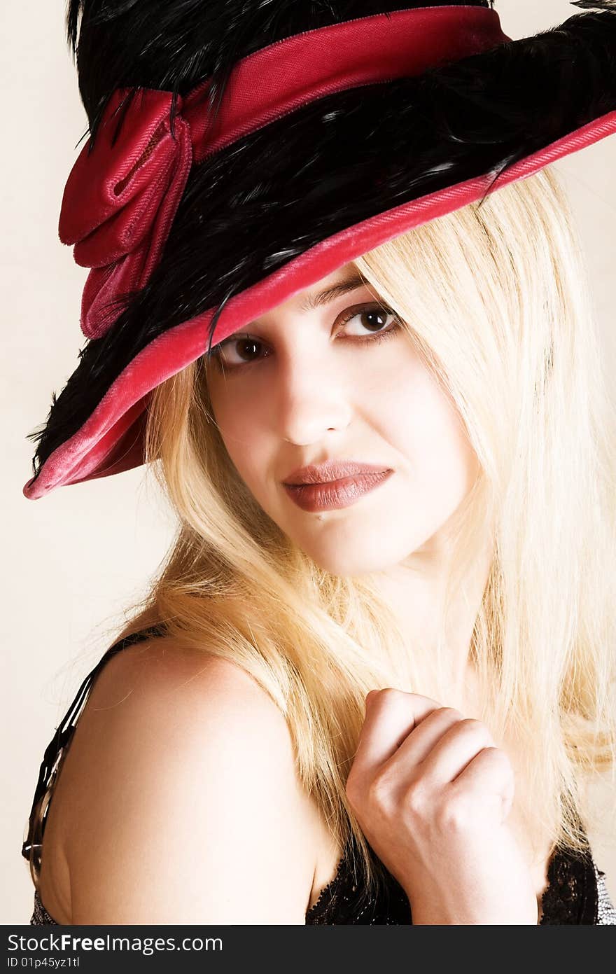 Beautiful young blond female wearing a hat. Beautiful young blond female wearing a hat