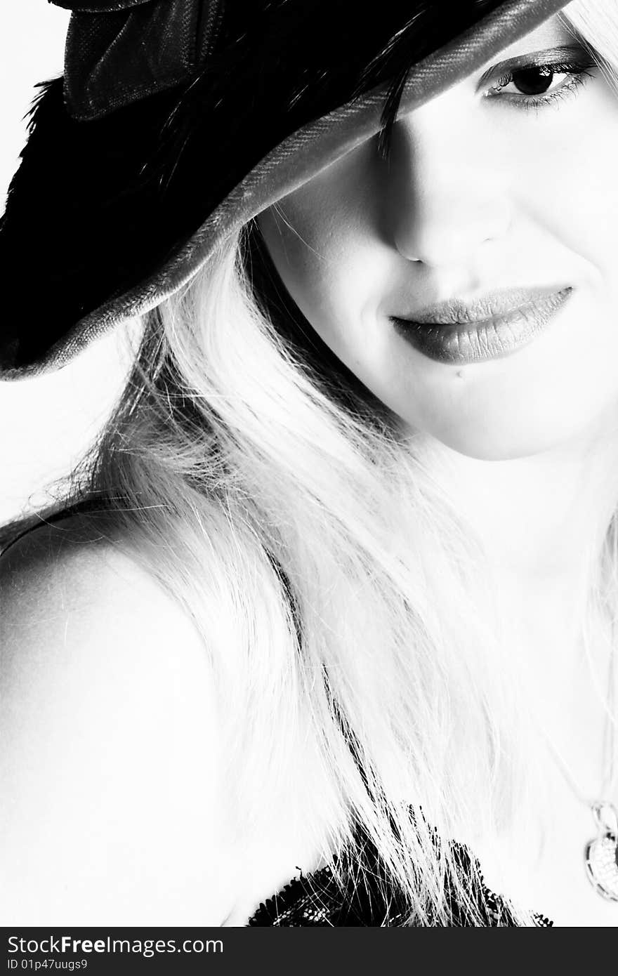 Beautiful young blond female wearing a hat. Beautiful young blond female wearing a hat