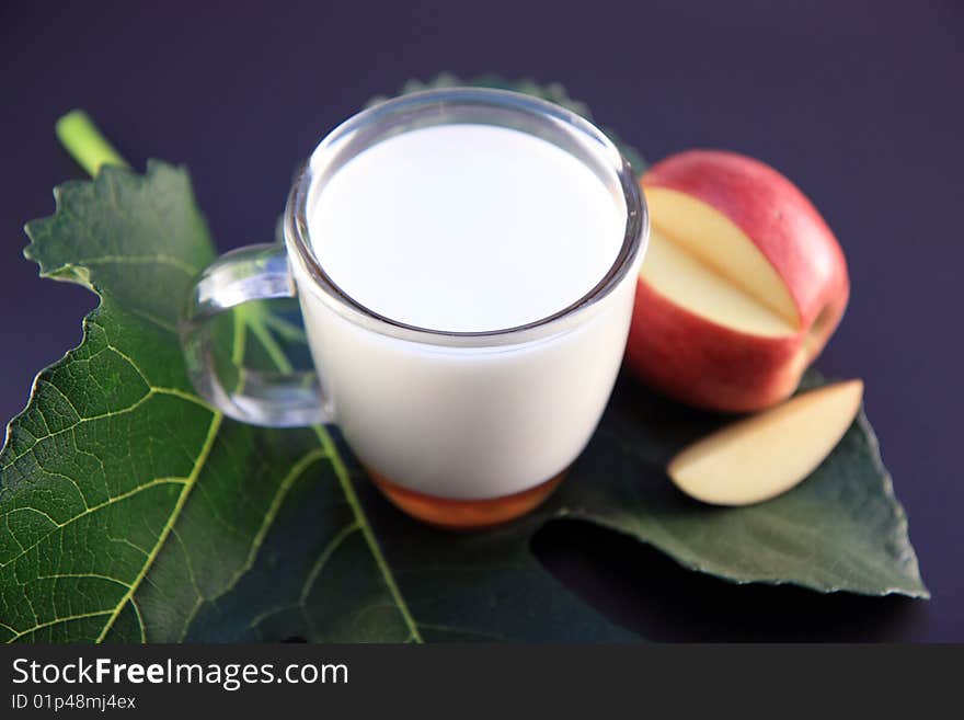 Milk apple on the black background. Milk apple on the black background