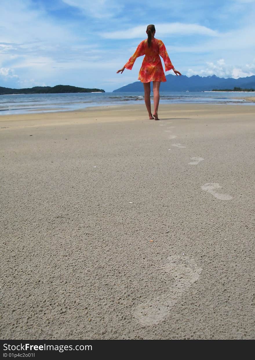 Young woman on a tropical beach of Langkawi island, Malaysia. Young woman on a tropical beach of Langkawi island, Malaysia