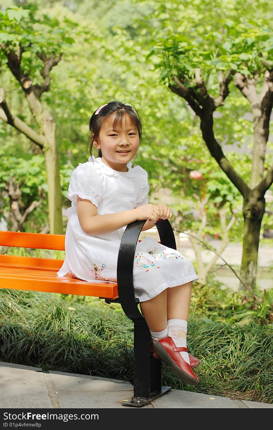 Beautiful little girl in white