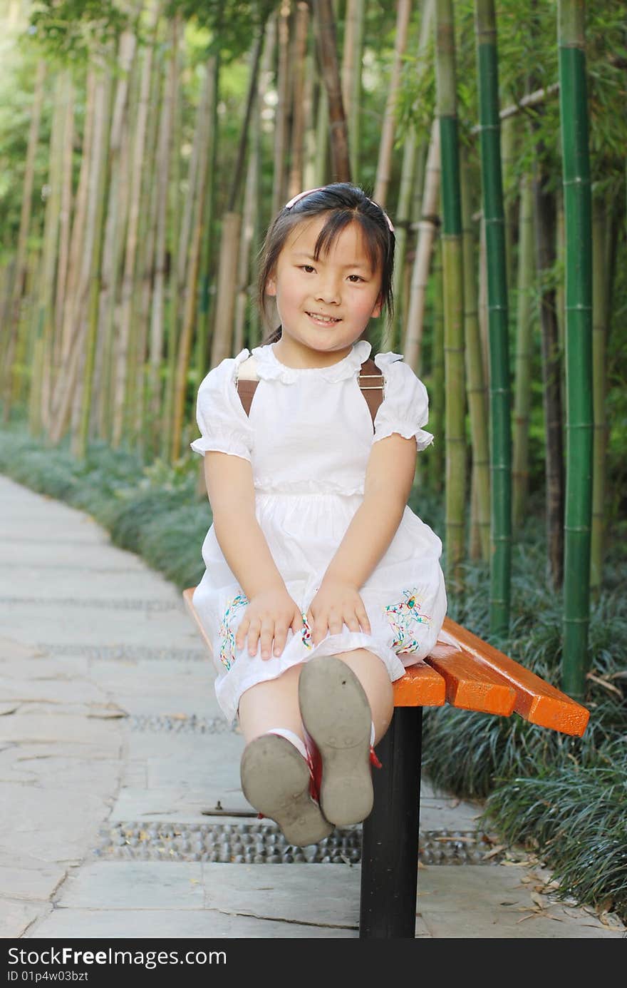 Beautiful little girl in white