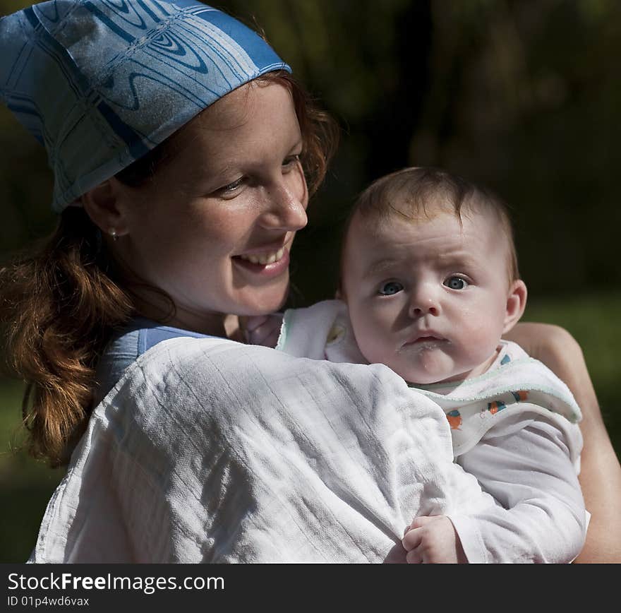 Young lady with baby infant