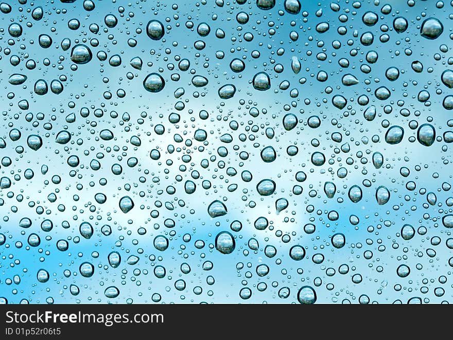 Water drops on glass background. Water drops on glass background