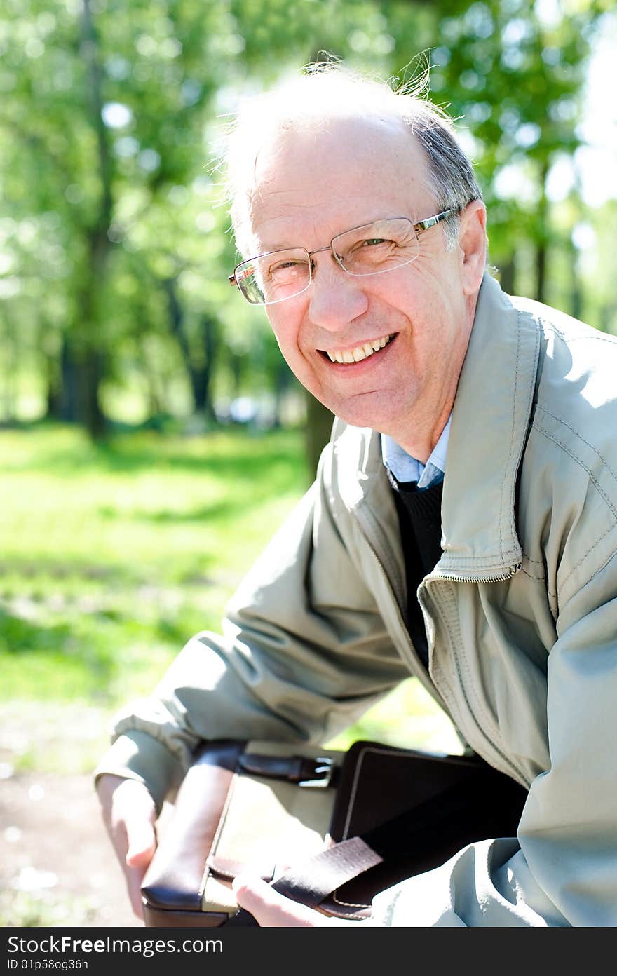 Portrait of the cheerful mature businessman