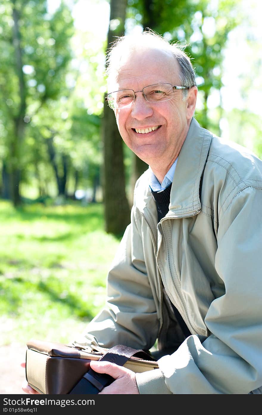 Portrait of the smiling mature businessman