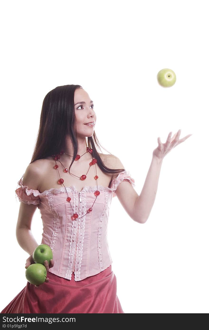 Brunette girl with fruit  - three green apples