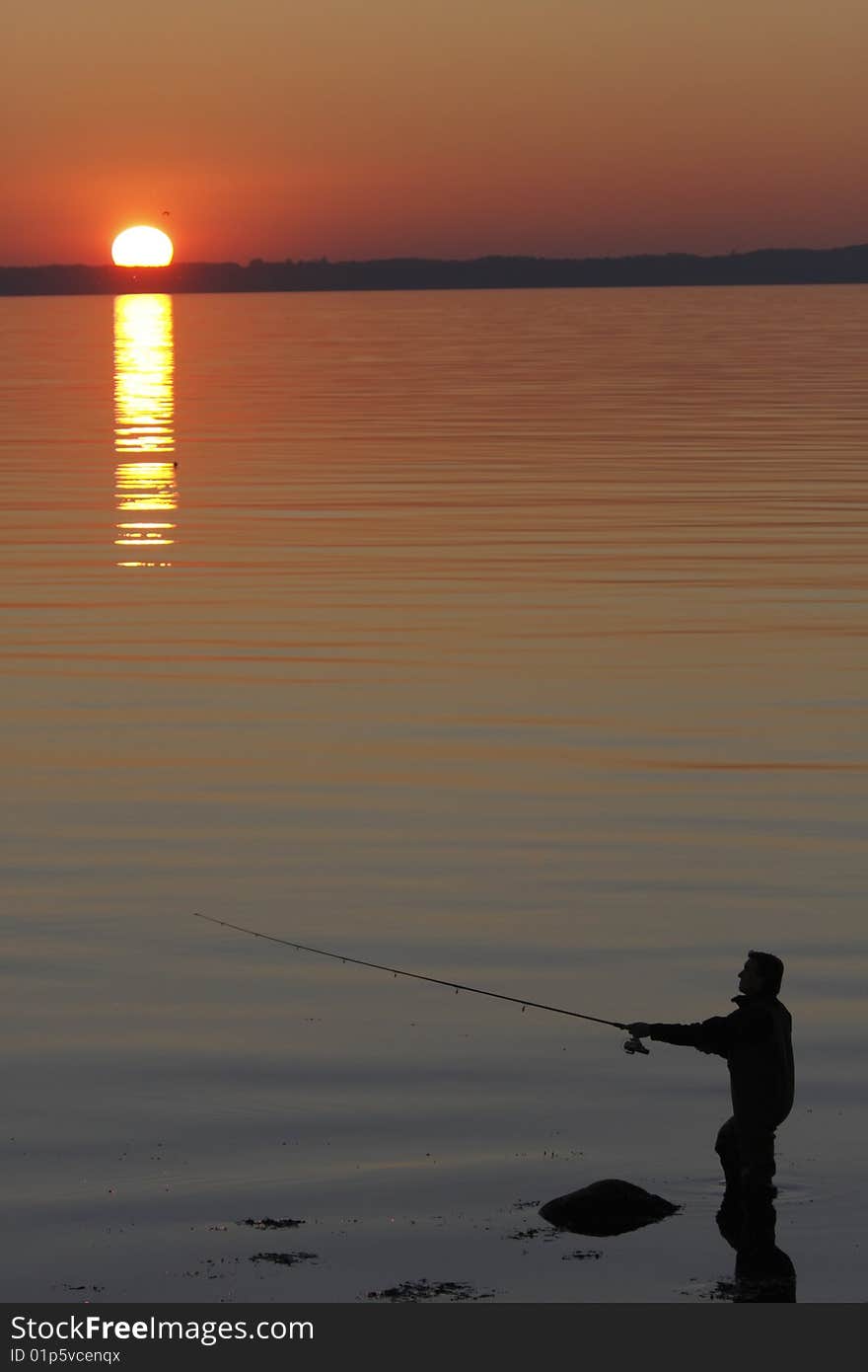 Fishing in a beautiful sunset. Fishing in a beautiful sunset