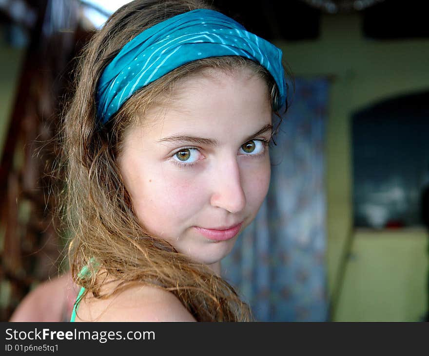 Casual portrait of a young girl with a blue bandage. Casual portrait of a young girl with a blue bandage