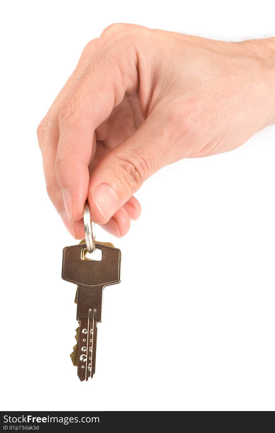 Hand holding keys isolated on white background