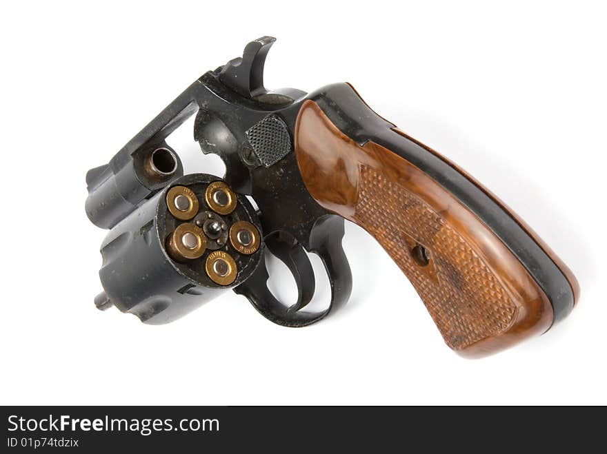 Revolver with bullets isolated over white background. Revolver with bullets isolated over white background