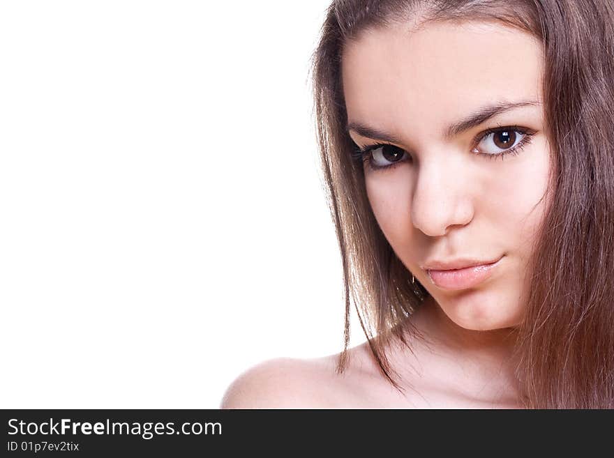 Beautiful woman face on a white background isolated