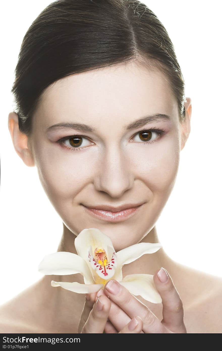 Portrait of young woman with white orchid. Portrait of young woman with white orchid