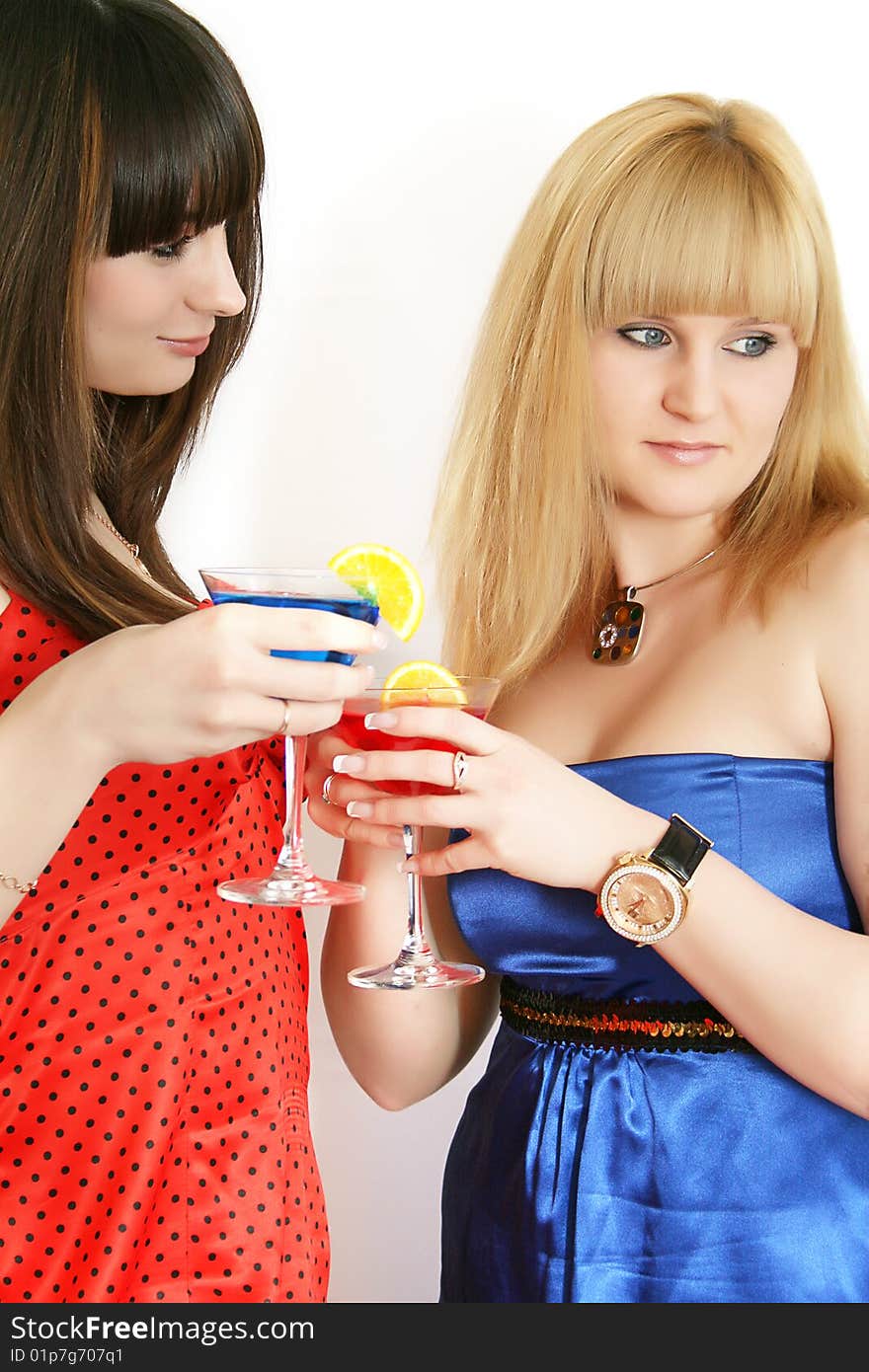 Two pretty friends with cocktail