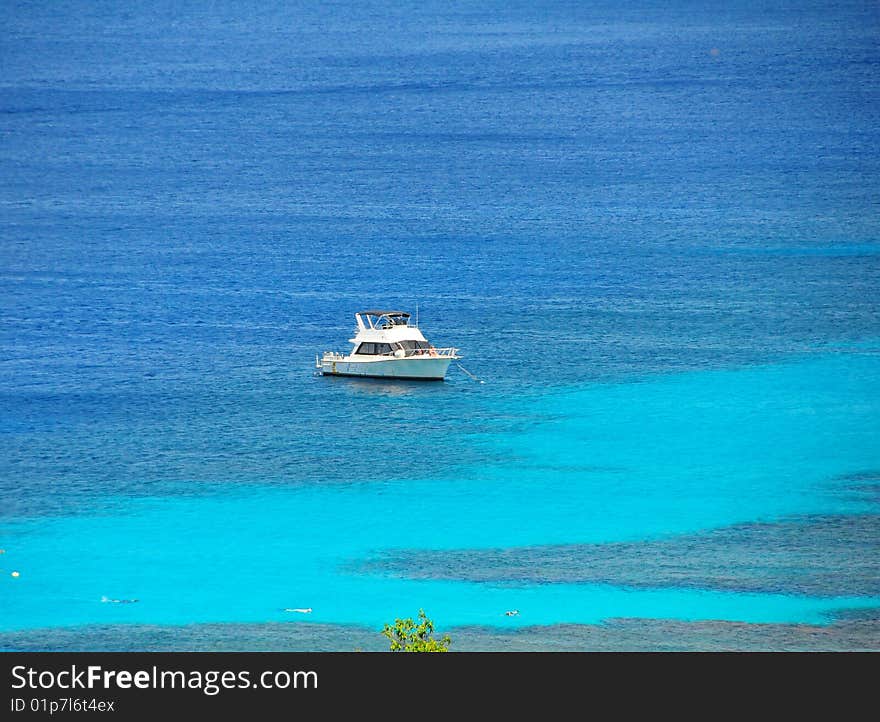 Honduran boat in blue coastal. Honduran boat in blue coastal