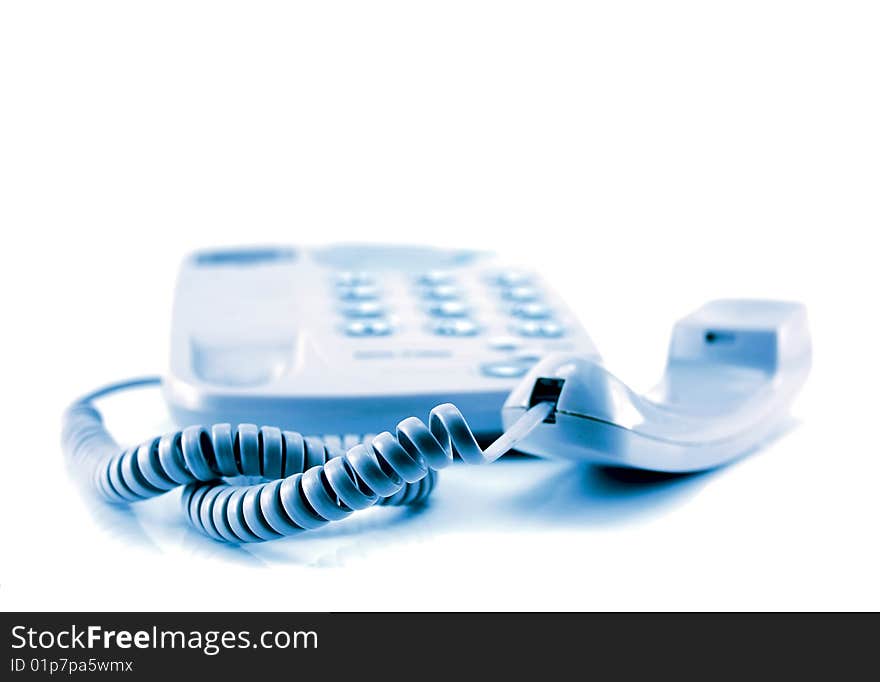 A telephone isolated on a white background, in blue. A telephone isolated on a white background, in blue