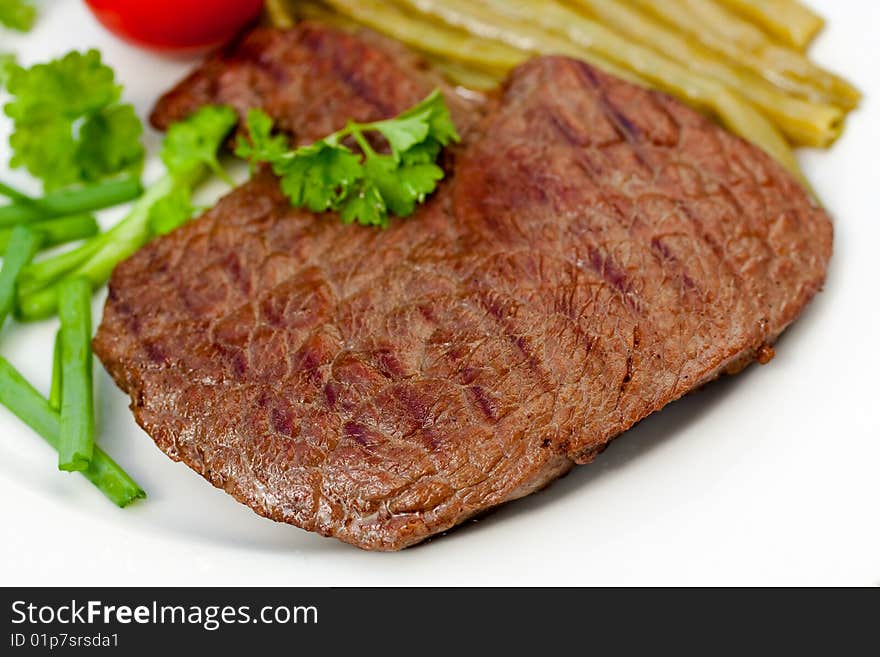 Fresh  sirloin strip steak with vegetables