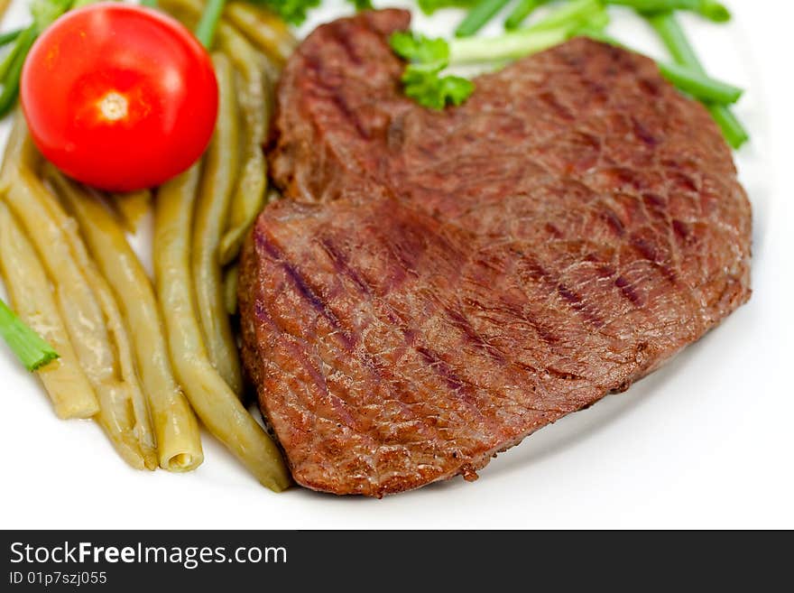 Fresh  sirloin strip steak with vegetables