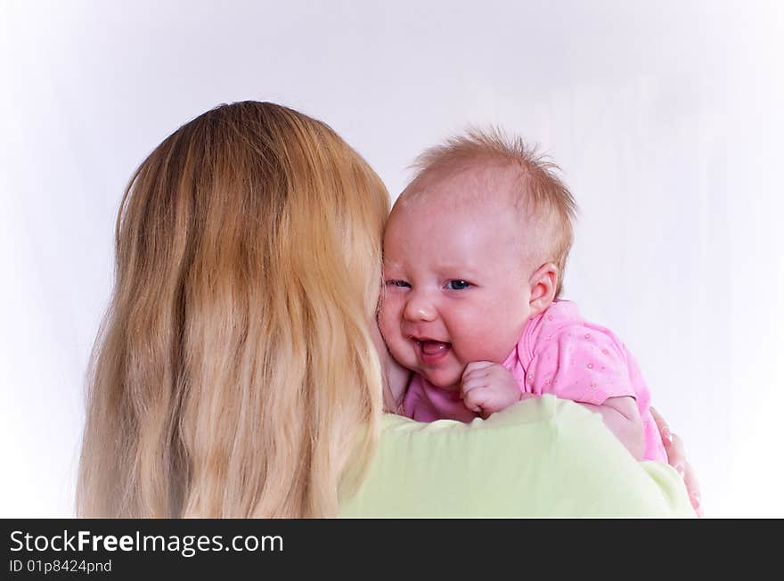 Loving mother holding newborn baby,