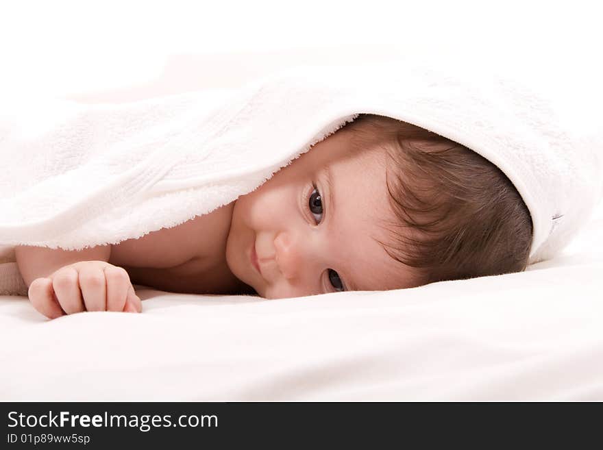 Three-month old baby girl in towel