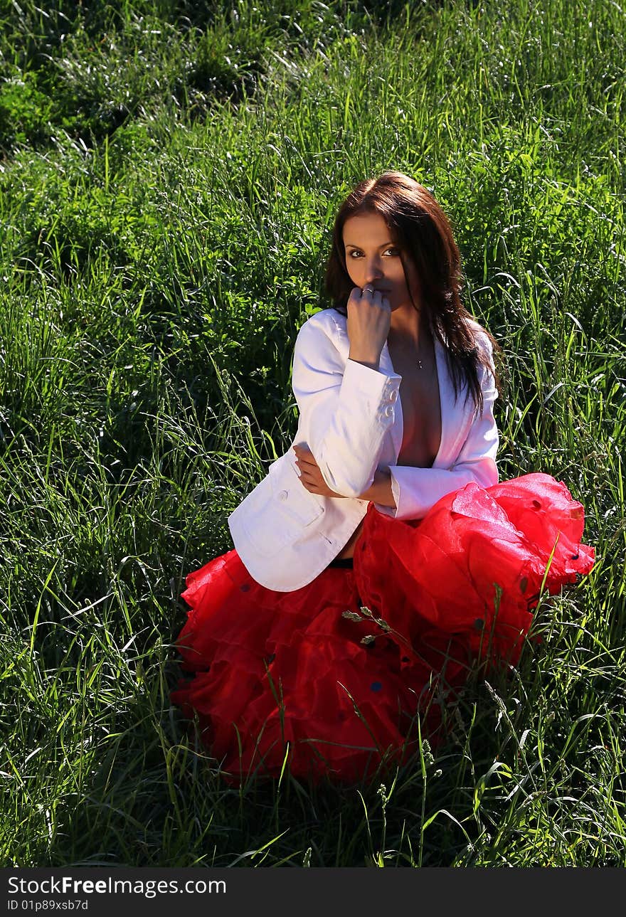 Portrait of young beautiful woman on  nature