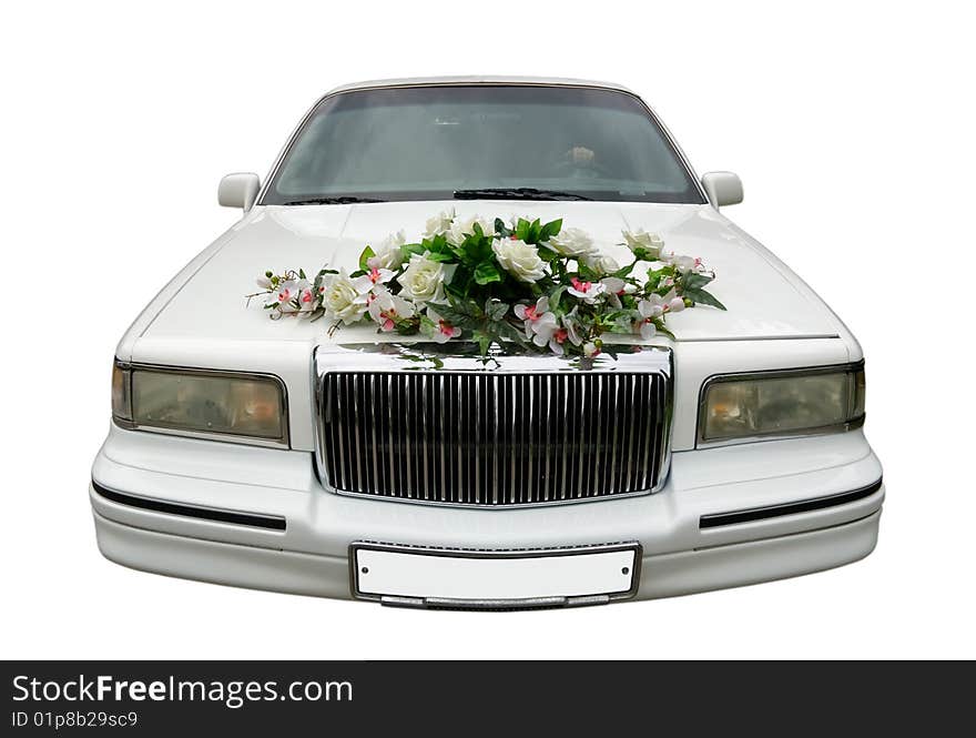 The wedding car decorated with flowers isolated on a white background