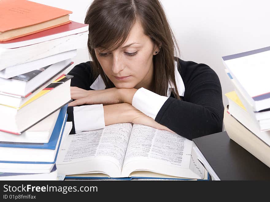 Teenage girl studying at the desk. Teenage girl studying at the desk