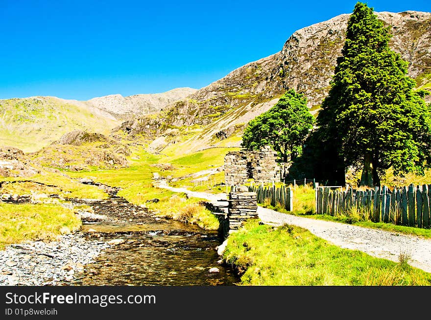 Stream with slate wall in north wales. Stream with slate wall in north wales