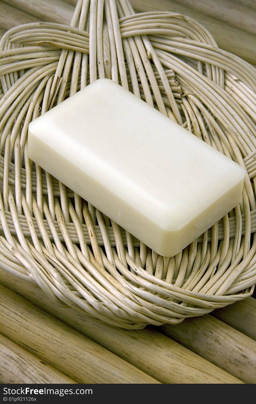 soap dish on wooden bath mat