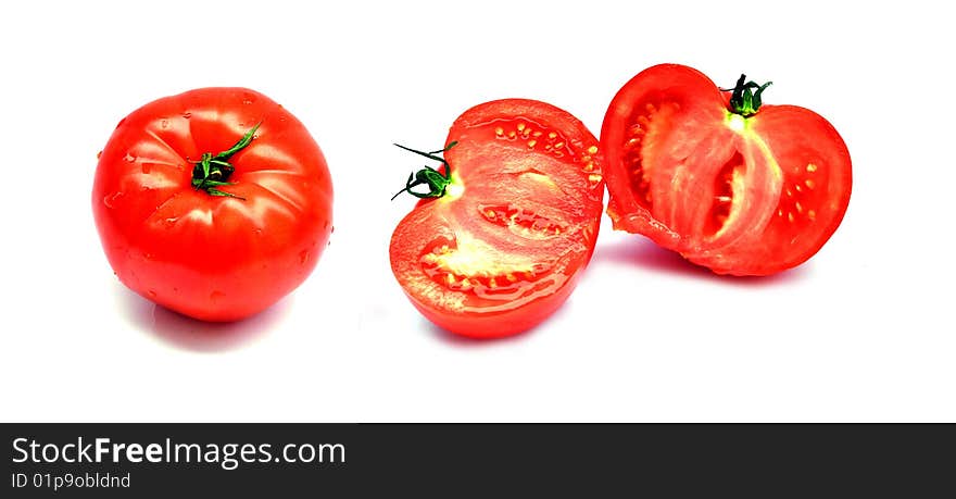 Whole and cuted tomato on the white background. Whole and cuted tomato on the white background.