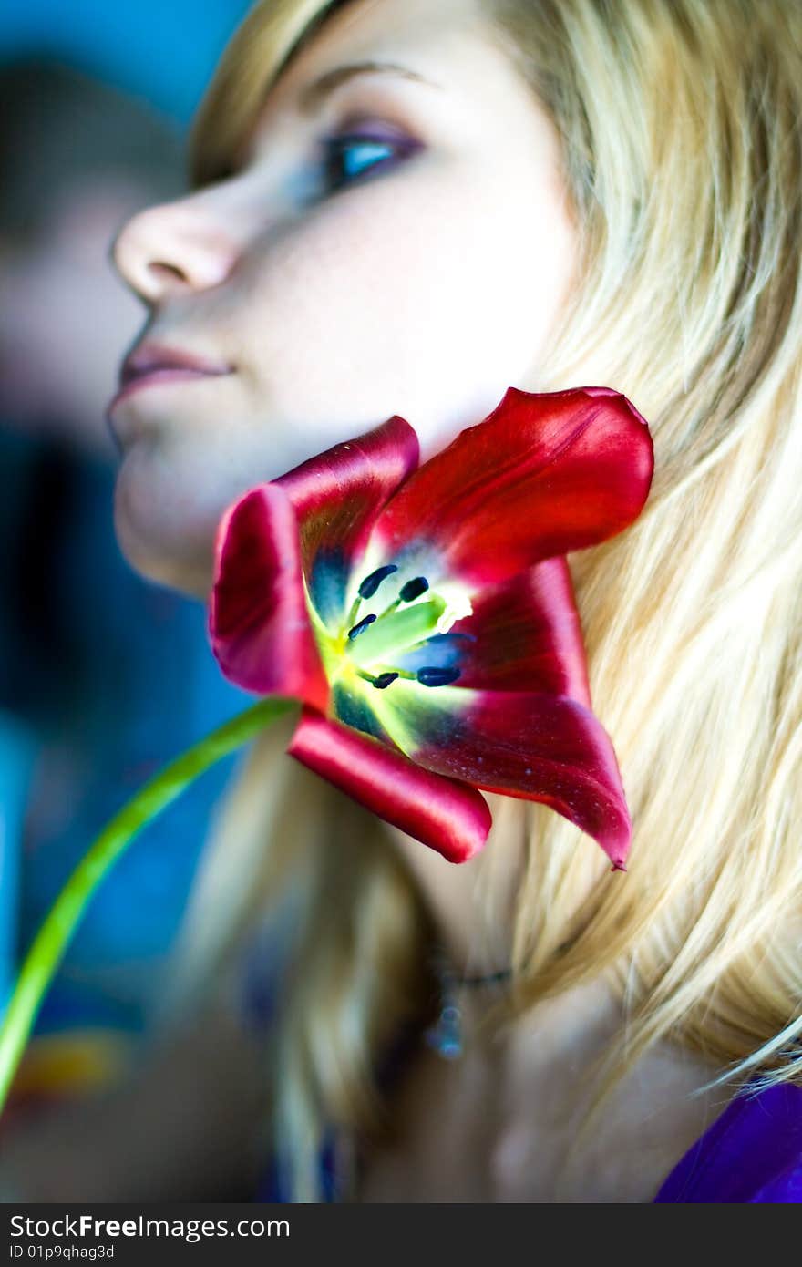 Girl with red tulip