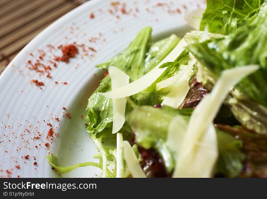 Plate Of Salad On The Table