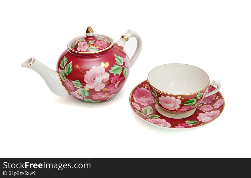 Floral-painted tea service isolated