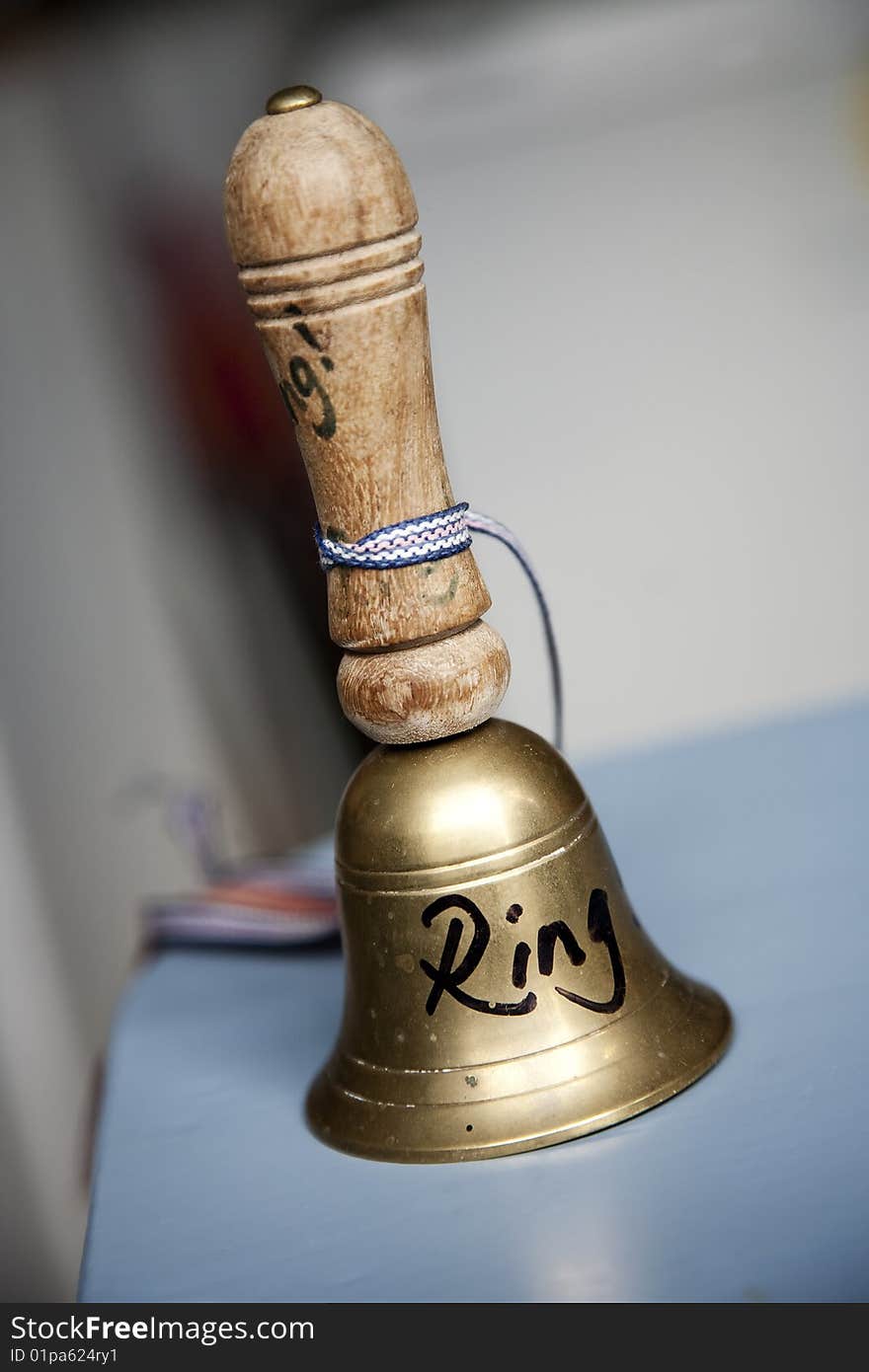 Old fasioned bell on counter. Old fasioned bell on counter