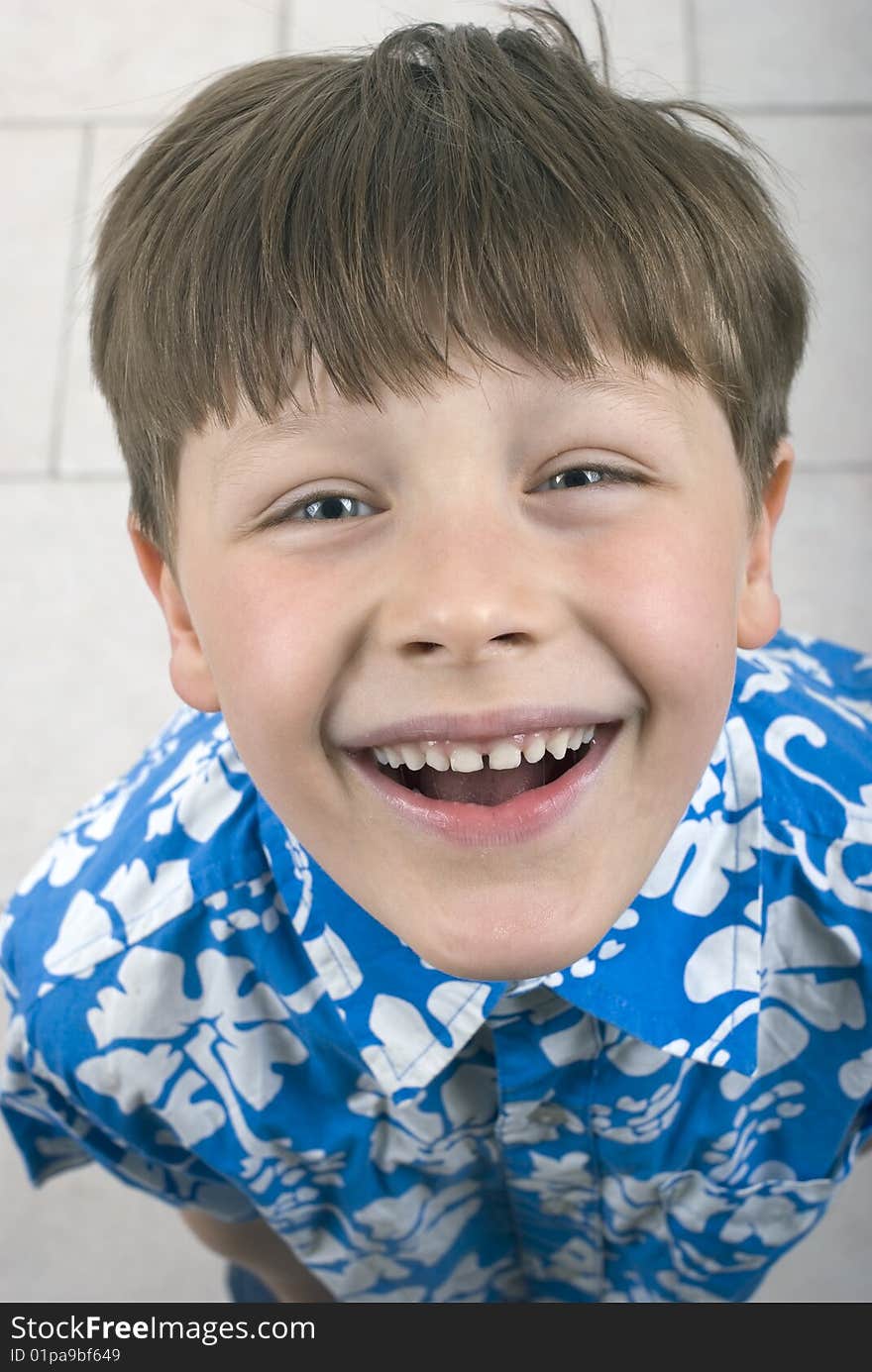 Photo of young boy looking at camera