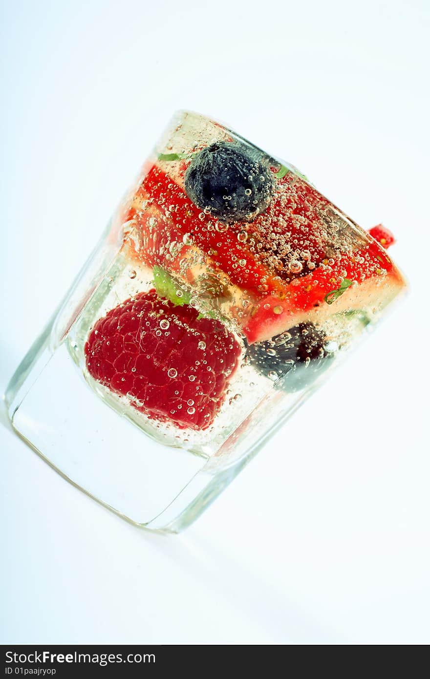 MIXED SUMMER BERRIES SUSPENDED IN A CHAMPAGNE AND ELDERFLOWER JELLY. MIXED SUMMER BERRIES SUSPENDED IN A CHAMPAGNE AND ELDERFLOWER JELLY