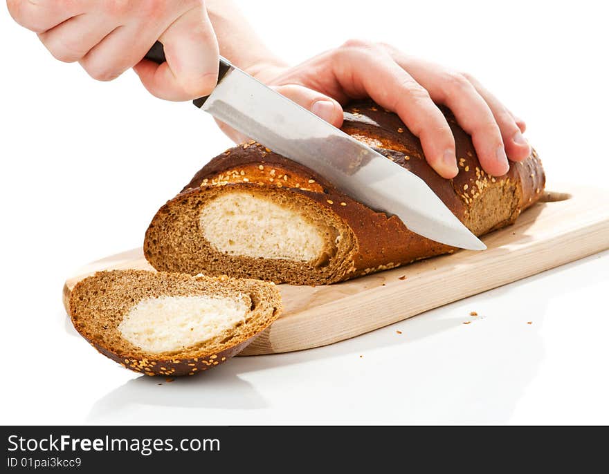 Hand the cutting bread loaf with a knife