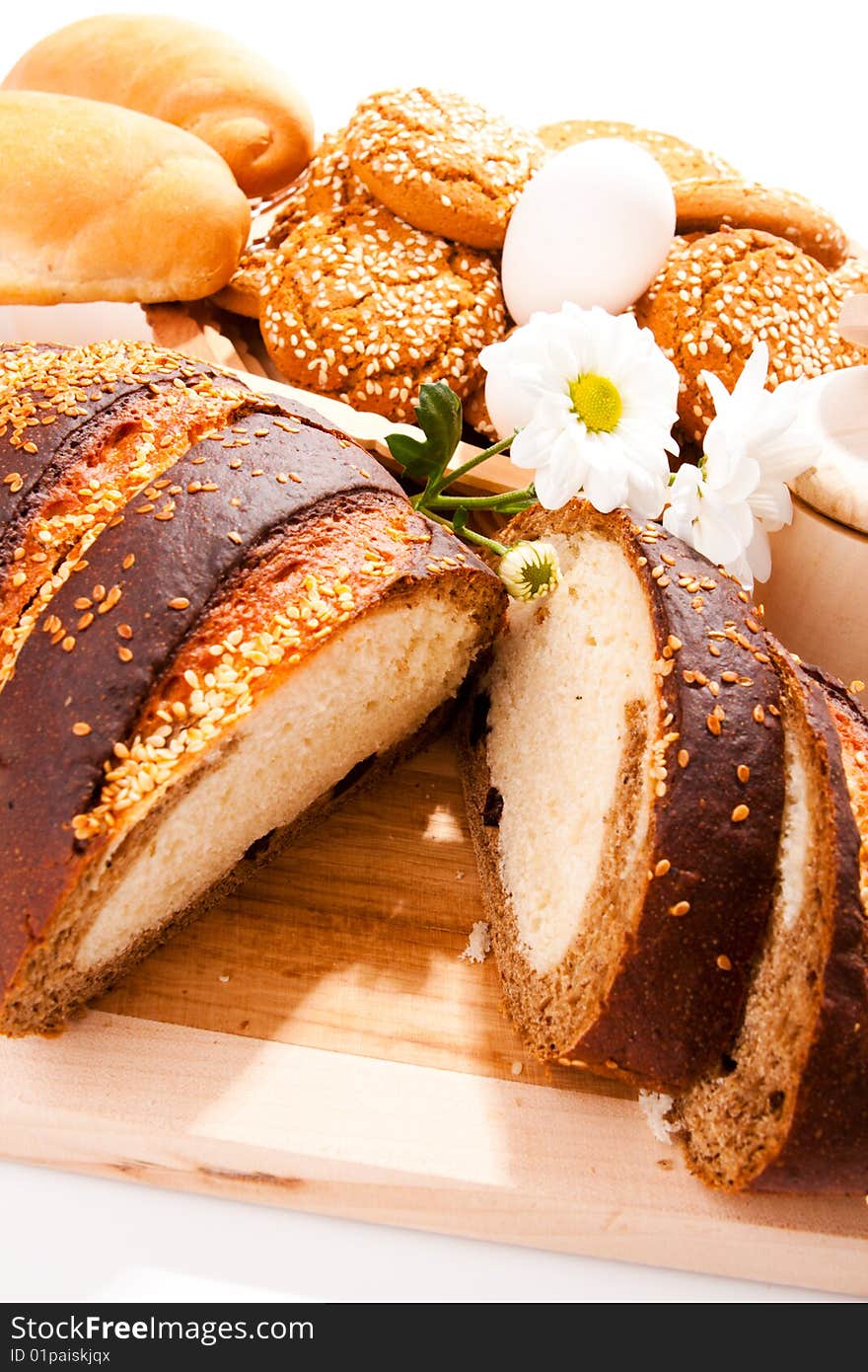 Bread on the cutting board, biscuits, rolls. Bread on the cutting board, biscuits, rolls