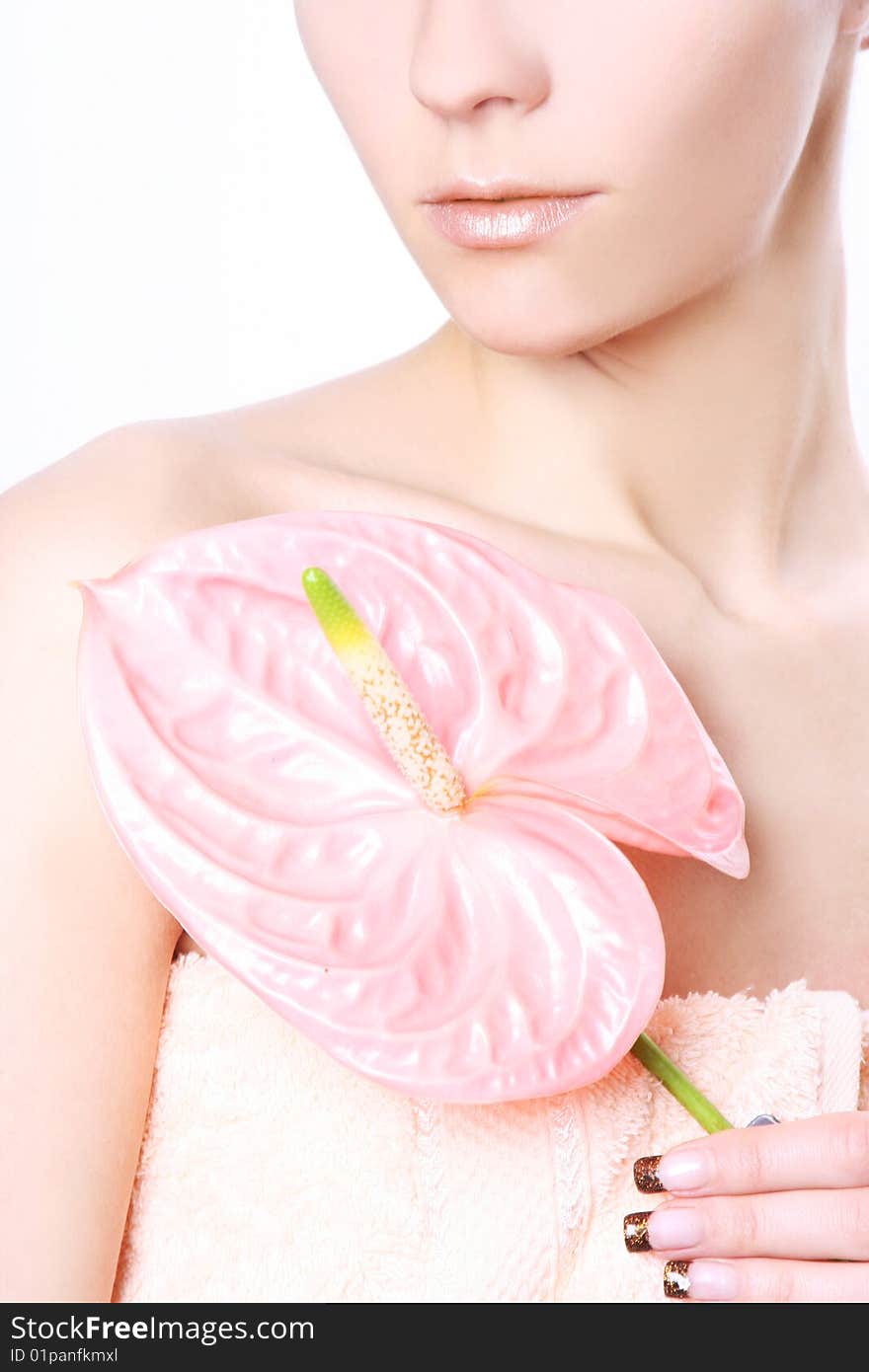 Young woman with pink flower. Young woman with pink flower