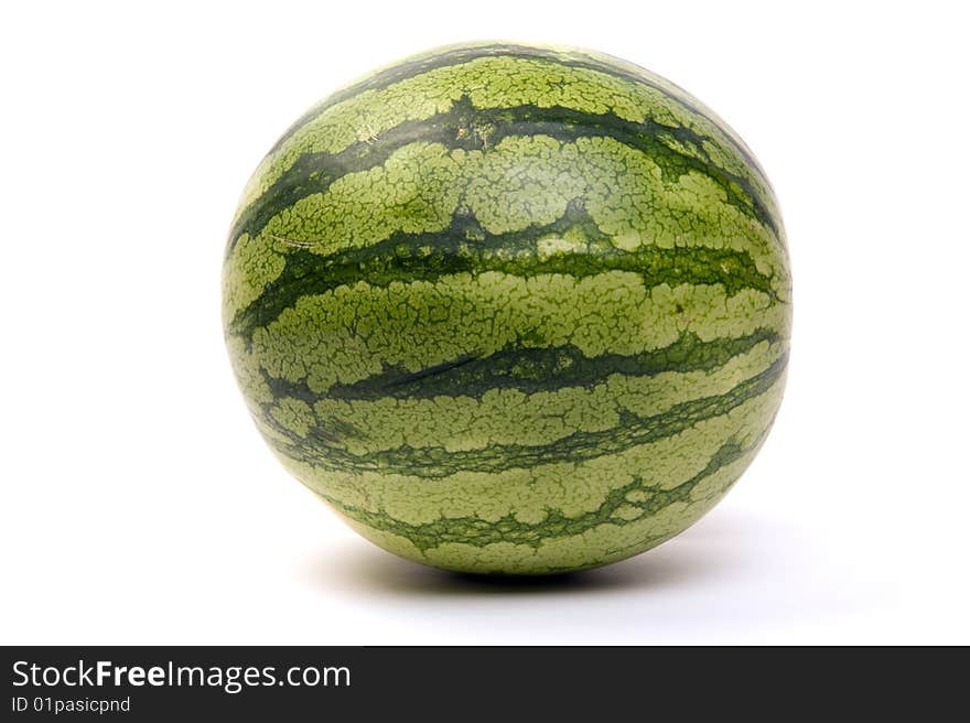 Side view of a whole watermelon isolated on white