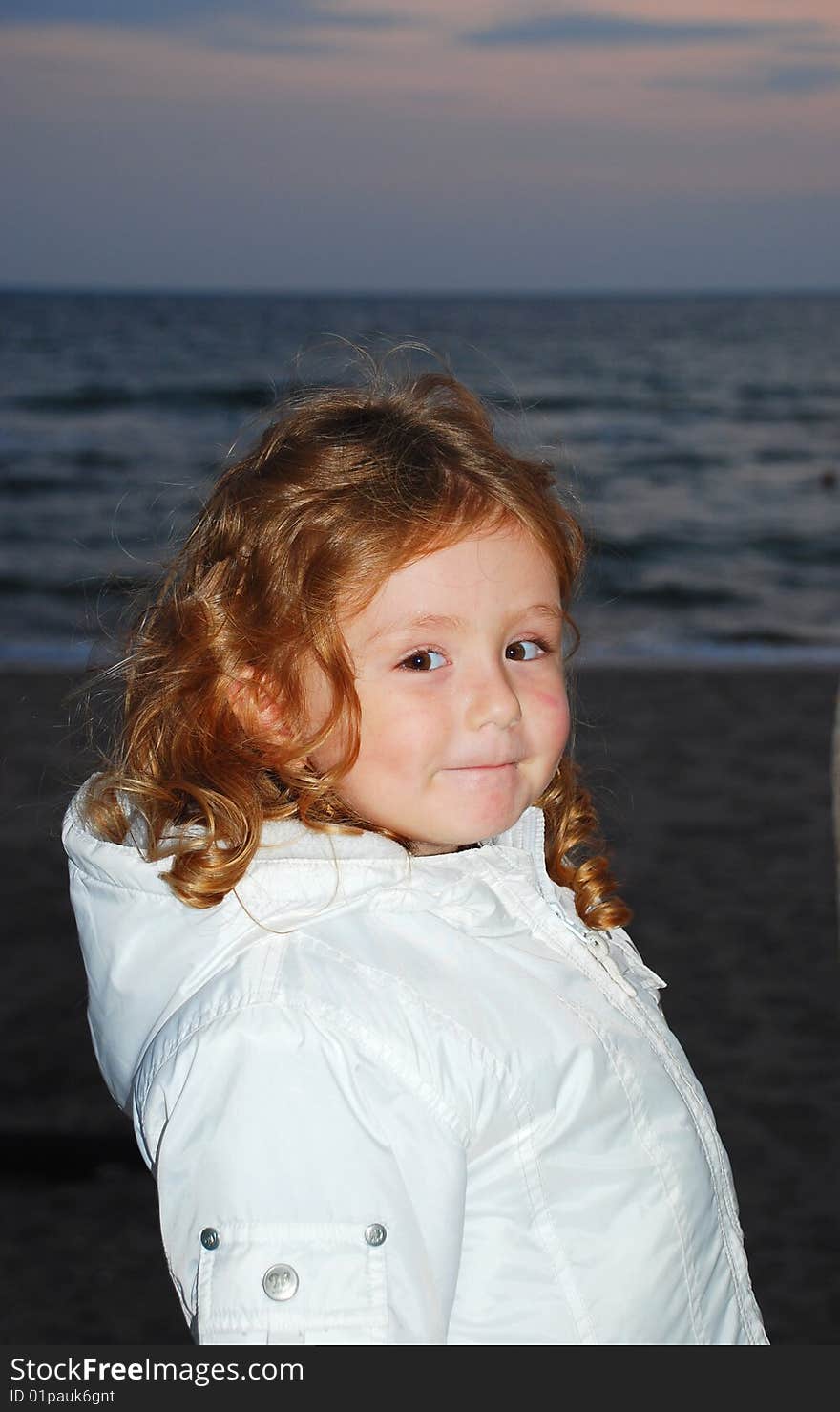 Girl near the beach when sun downs