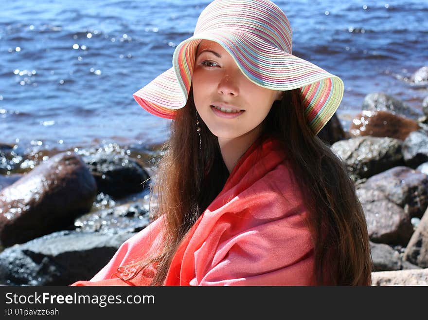 Funny young woman near the sea. Funny young woman near the sea