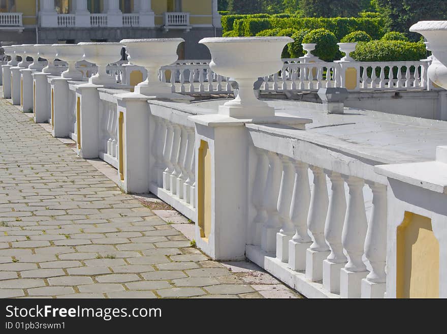 Protection with vases and columns. A landscape in a sunny day.