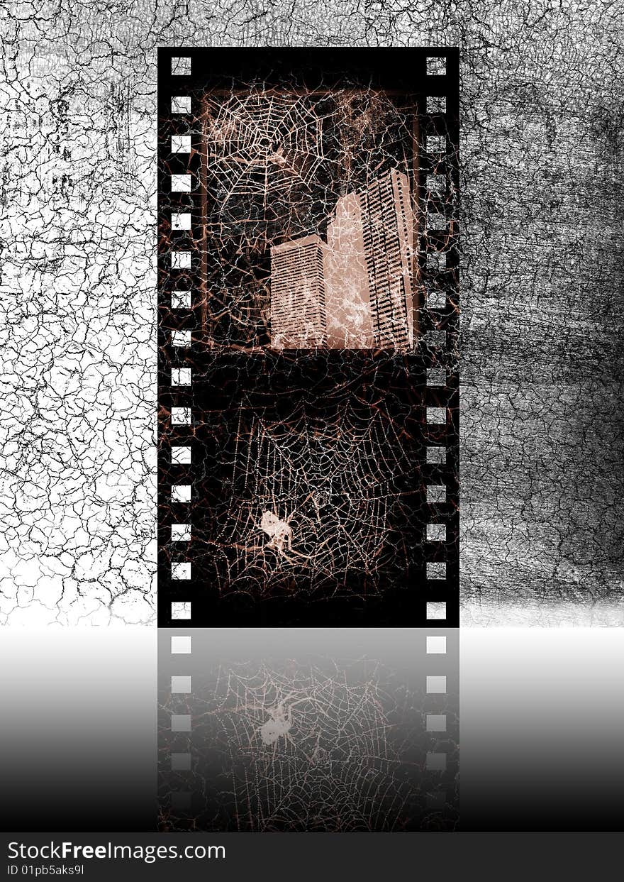 Old movie film with negatives on the grey cracked background