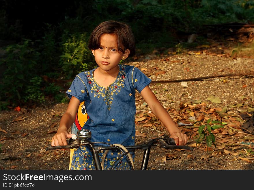 Girl driving her bicycle