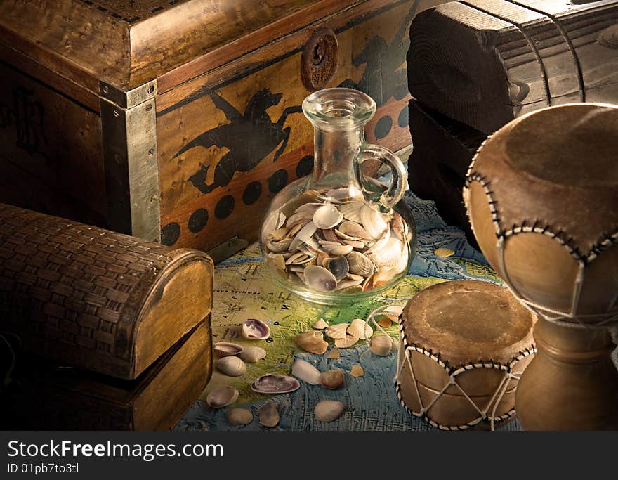 Wooden chests with jug and sea shells