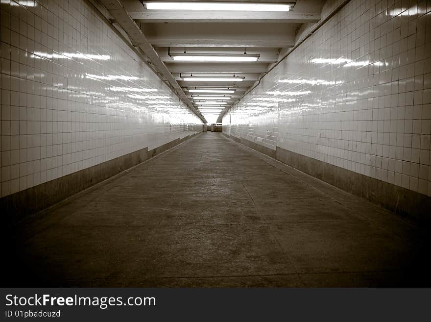 A tiled subway walkway at a Brooklyn subway station